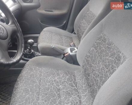 Желтый Дэу Ланос, объемом двигателя 1.5 л и пробегом 190 тыс. км за 1750 $, фото 18 на Automoto.ua