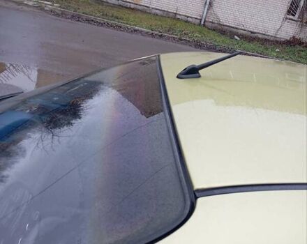 Желтый Дэу Ланос, объемом двигателя 1.39 л и пробегом 195 тыс. км за 2200 $, фото 9 на Automoto.ua