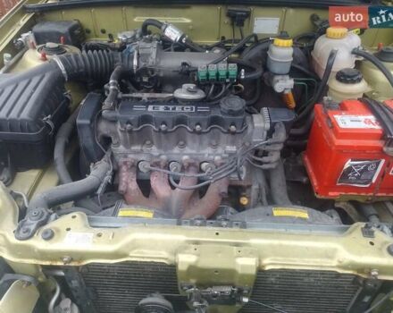 Желтый Дэу Ланос, объемом двигателя 1.5 л и пробегом 190 тыс. км за 1750 $, фото 10 на Automoto.ua