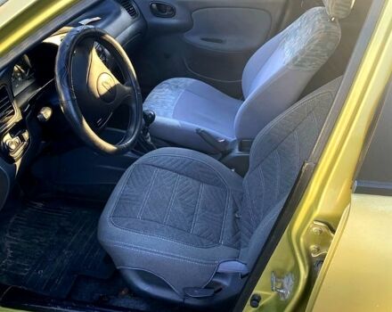 Жовтий Деу Ланос, об'ємом двигуна 1.5 л та пробігом 0 тис. км за 1400 $, фото 4 на Automoto.ua