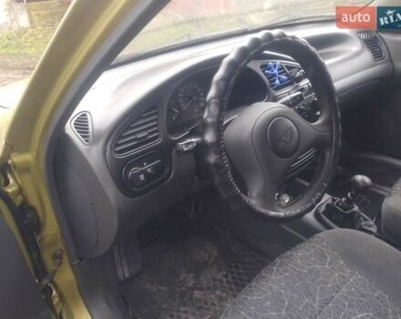 Желтый Дэу Ланос, объемом двигателя 1.5 л и пробегом 190 тыс. км за 1750 $, фото 22 на Automoto.ua