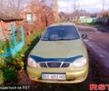 Желтый Дэу Ланос, объемом двигателя 1.4 л и пробегом 300 тыс. км за 1300 $, фото 2 на Automoto.ua