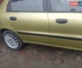 Желтый Дэу Ланос, объемом двигателя 1.5 л и пробегом 190 тыс. км за 1750 $, фото 7 на Automoto.ua