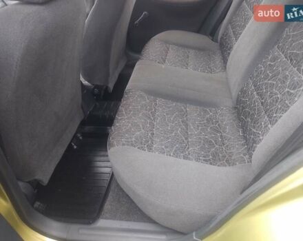Желтый Дэу Ланос, объемом двигателя 1.5 л и пробегом 190 тыс. км за 1750 $, фото 25 на Automoto.ua