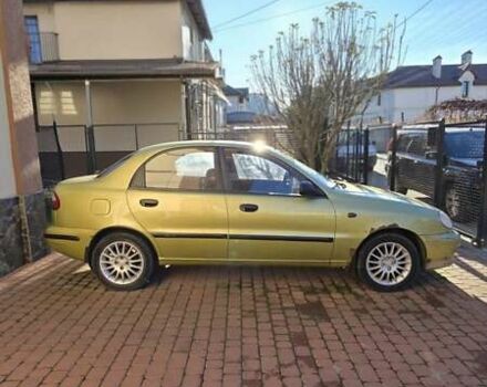 Желтый Дэу Ланос, объемом двигателя 1.5 л и пробегом 310 тыс. км за 1500 $, фото 1 на Automoto.ua