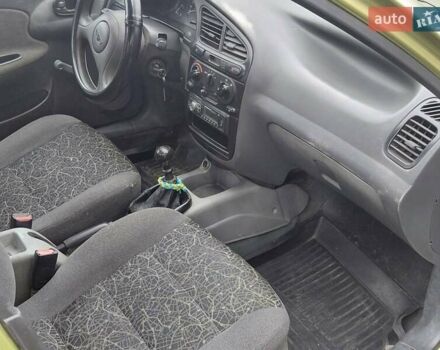 Желтый Дэу Ланос, объемом двигателя 1.5 л и пробегом 250 тыс. км за 1700 $, фото 3 на Automoto.ua