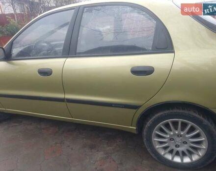 Желтый Дэу Ланос, объемом двигателя 1.5 л и пробегом 190 тыс. км за 1750 $, фото 4 на Automoto.ua