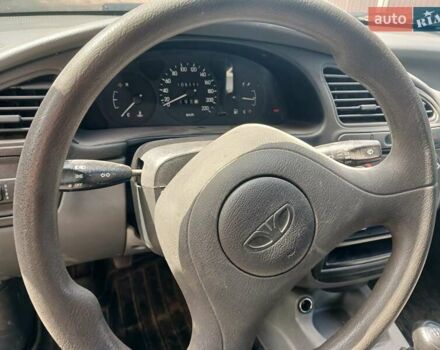 Желтый Дэу Ланос, объемом двигателя 1.39 л и пробегом 105 тыс. км за 2650 $, фото 3 на Automoto.ua