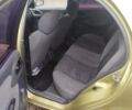 Желтый Дэу Ланос, объемом двигателя 1.5 л и пробегом 200 тыс. км за 1300 $, фото 6 на Automoto.ua