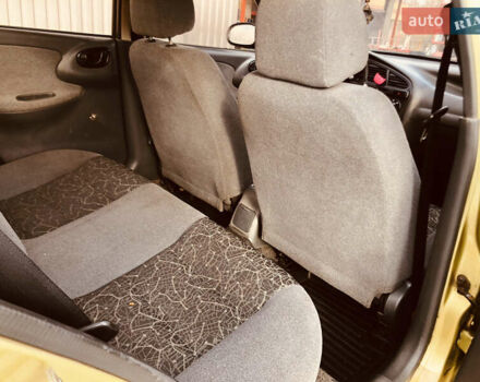 Жовтий Деу Ланос, об'ємом двигуна 1.39 л та пробігом 240 тис. км за 1700 $, фото 20 на Automoto.ua