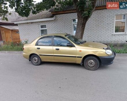 Желтый Дэу Ланос, объемом двигателя 1.5 л и пробегом 244 тыс. км за 1490 $, фото 7 на Automoto.ua