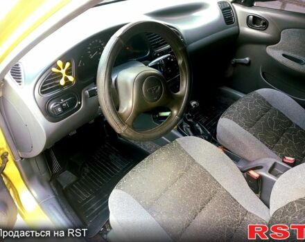 Жовтий Деу Ланос, об'ємом двигуна 1.4 л та пробігом 119 тис. км за 2450 $, фото 10 на Automoto.ua