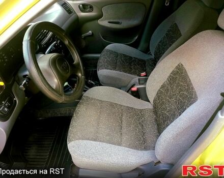 Жовтий Деу Ланос, об'ємом двигуна 1.4 л та пробігом 119 тис. км за 2450 $, фото 9 на Automoto.ua