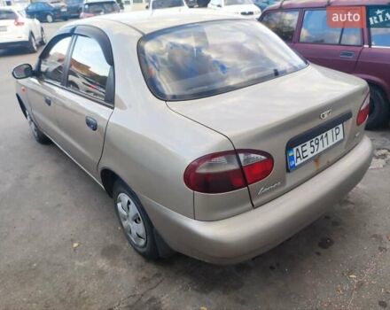 Желтый Дэу Ланос, объемом двигателя 1.39 л и пробегом 215 тыс. км за 2200 $, фото 6 на Automoto.ua