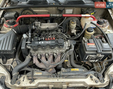 Желтый Дэу Ланос, объемом двигателя 1.5 л и пробегом 223 тыс. км за 1499 $, фото 5 на Automoto.ua