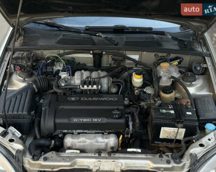 Желтый Дэу Ланос, объемом двигателя 1.6 л и пробегом 115 тыс. км за 2750 $, фото 12 на Automoto.ua