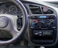 Желтый Дэу Ланос, объемом двигателя 1.5 л и пробегом 199 тыс. км за 3300 $, фото 4 на Automoto.ua