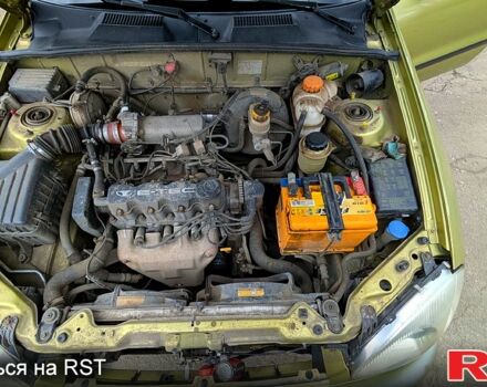 Желтый Дэу Ланос, объемом двигателя 1.5 л и пробегом 199 тыс. км за 3300 $, фото 6 на Automoto.ua