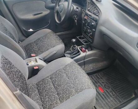 Желтый Дэу Ланос, объемом двигателя 1.39 л и пробегом 215 тыс. км за 2200 $, фото 8 на Automoto.ua