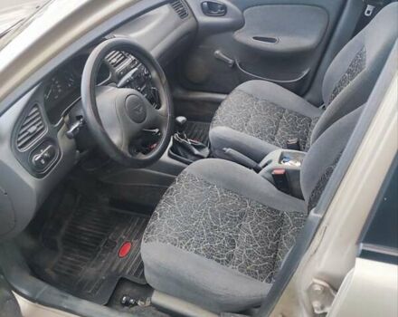 Желтый Дэу Ланос, объемом двигателя 1.39 л и пробегом 215 тыс. км за 2200 $, фото 14 на Automoto.ua