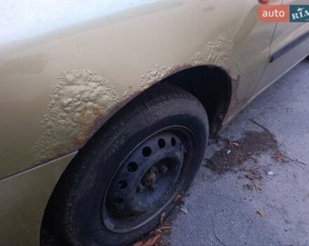 Желтый Дэу Ланос, объемом двигателя 1.6 л и пробегом 137 тыс. км за 1500 $, фото 2 на Automoto.ua