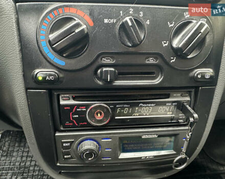 Желтый Дэу Ланос, объемом двигателя 1.5 л и пробегом 223 тыс. км за 1499 $, фото 12 на Automoto.ua