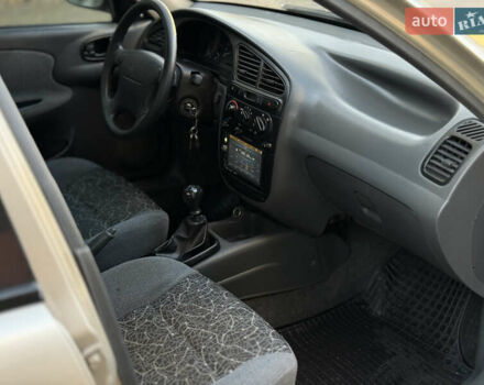 Желтый Дэу Ланос, объемом двигателя 1.6 л и пробегом 115 тыс. км за 2750 $, фото 11 на Automoto.ua