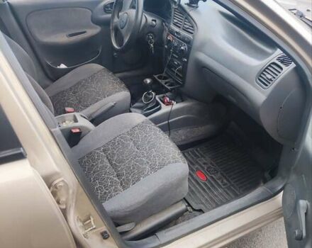 Желтый Дэу Ланос, объемом двигателя 1.39 л и пробегом 215 тыс. км за 2200 $, фото 11 на Automoto.ua