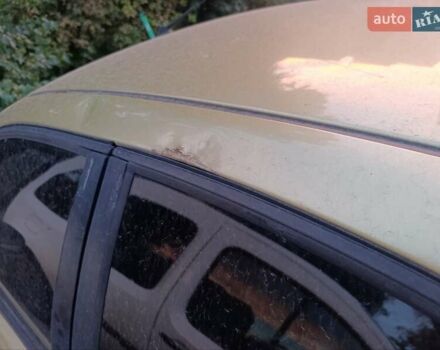 Желтый Дэу Ланос, объемом двигателя 1.6 л и пробегом 137 тыс. км за 1500 $, фото 1 на Automoto.ua