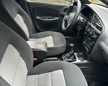 Желтый Дэу Ланос, объемом двигателя 1.5 л и пробегом 223 тыс. км за 1499 $, фото 15 на Automoto.ua