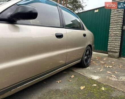 Жовтий Деу Ланос, об'ємом двигуна 1.5 л та пробігом 222 тис. км за 1599 $, фото 4 на Automoto.ua