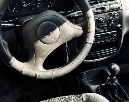 Желтый Дэу Ланос, объемом двигателя 1.5 л и пробегом 165 тыс. км за 1599 $, фото 11 на Automoto.ua