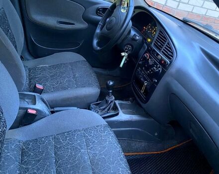 Жовтий Деу Ланос, об'ємом двигуна 1.5 л та пробігом 0 тис. км за 1500 $, фото 6 на Automoto.ua