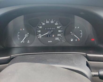 Желтый Дэу Ланос, объемом двигателя 1.39 л и пробегом 215 тыс. км за 2200 $, фото 10 на Automoto.ua