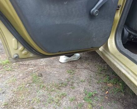 Жовтий Деу Ланос, об'ємом двигуна 1.4 л та пробігом 59 тис. км за 2000 $, фото 7 на Automoto.ua