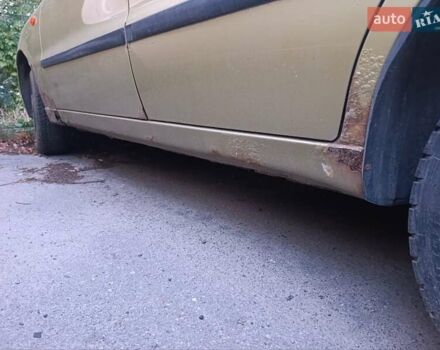 Желтый Дэу Ланос, объемом двигателя 1.6 л и пробегом 137 тыс. км за 1500 $, фото 5 на Automoto.ua