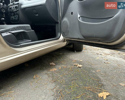 Желтый Дэу Ланос, объемом двигателя 1.5 л и пробегом 223 тыс. км за 1499 $, фото 2 на Automoto.ua