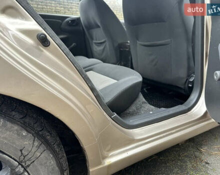 Желтый Дэу Ланос, объемом двигателя 1.5 л и пробегом 223 тыс. км за 1499 $, фото 3 на Automoto.ua