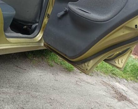 Жовтий Деу Ланос, об'ємом двигуна 1.4 л та пробігом 59 тис. км за 2000 $, фото 4 на Automoto.ua