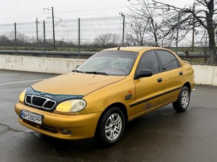 Желтый Дэу Ланос, объемом двигателя 1.5 л и пробегом 200 тыс. км за 2200 $, фото 1 на Automoto.ua