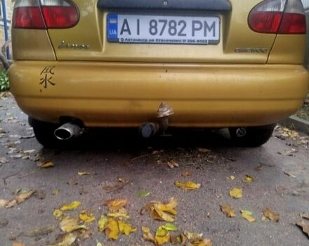 Желтый Дэу Ланос, объемом двигателя 1.5 л и пробегом 303 тыс. км за 1700 $, фото 1 на Automoto.ua