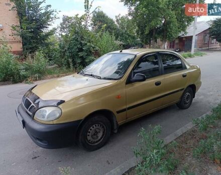 Желтый Дэу Ланос, объемом двигателя 1.5 л и пробегом 244 тыс. км за 1490 $, фото 1 на Automoto.ua