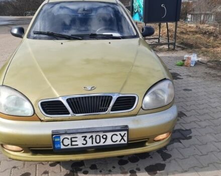 Жовтий Деу Ланос, об'ємом двигуна 1.39 л та пробігом 159 тис. км за 1350 $, фото 1 на Automoto.ua