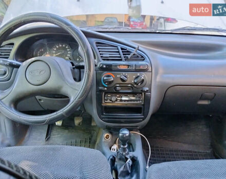 Серый Дэу Ланос, объемом двигателя 1.5 л и пробегом 233 тыс. км за 2000 $, фото 6 на Automoto.ua