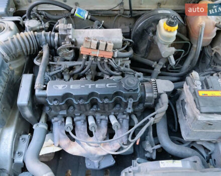 Серый Дэу Ланос, объемом двигателя 1.5 л и пробегом 233 тыс. км за 2000 $, фото 7 на Automoto.ua