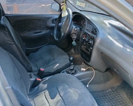 Серый Дэу Ланос, объемом двигателя 1.5 л и пробегом 233 тыс. км за 2000 $, фото 4 на Automoto.ua