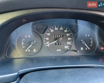 Серый Дэу Ланос, объемом двигателя 1.5 л и пробегом 233 тыс. км за 2000 $, фото 5 на Automoto.ua