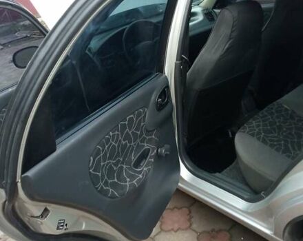 Серый Дэу Ланос, объемом двигателя 1.5 л и пробегом 300 тыс. км за 2000 $, фото 7 на Automoto.ua