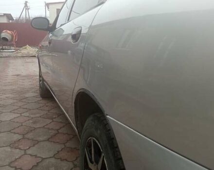 Серый Дэу Ланос, объемом двигателя 1.5 л и пробегом 300 тыс. км за 2000 $, фото 10 на Automoto.ua