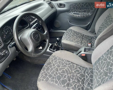 Серый Дэу Ланос, объемом двигателя 1.5 л и пробегом 292 тыс. км за 2699 $, фото 11 на Automoto.ua